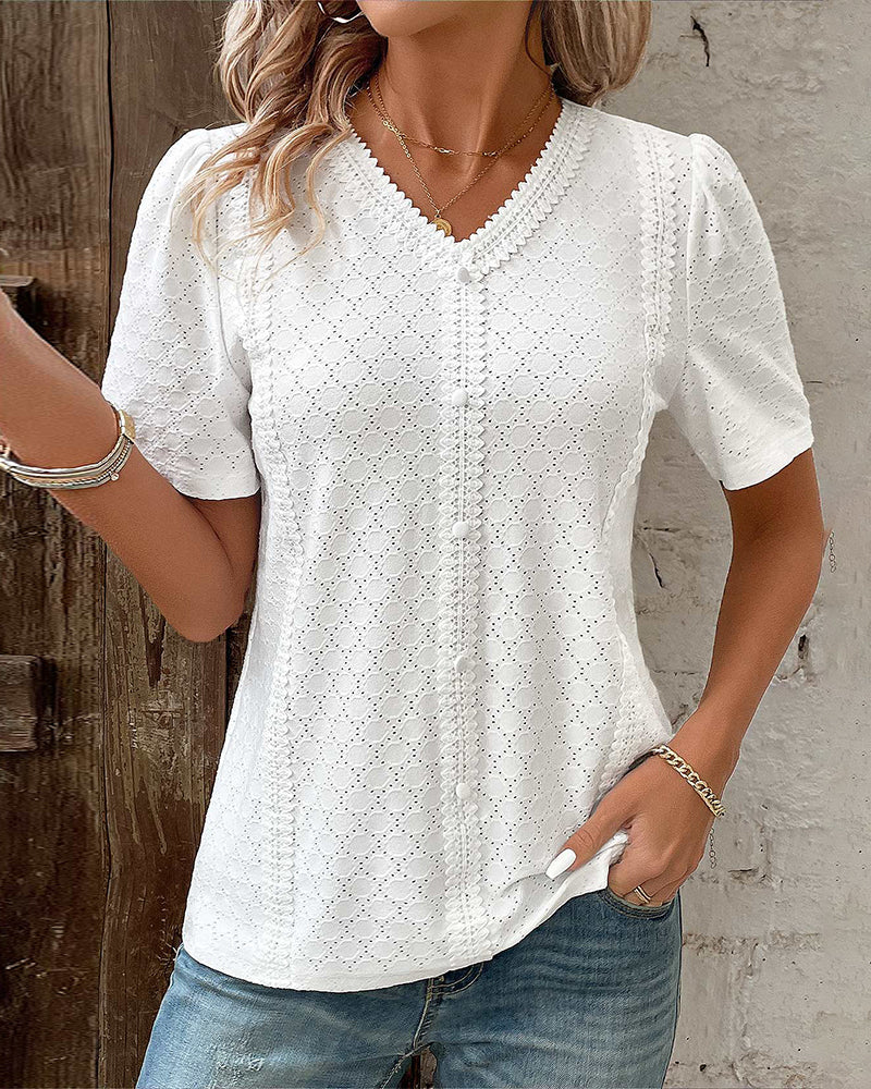 Top tinta unita con maniche a palloncino