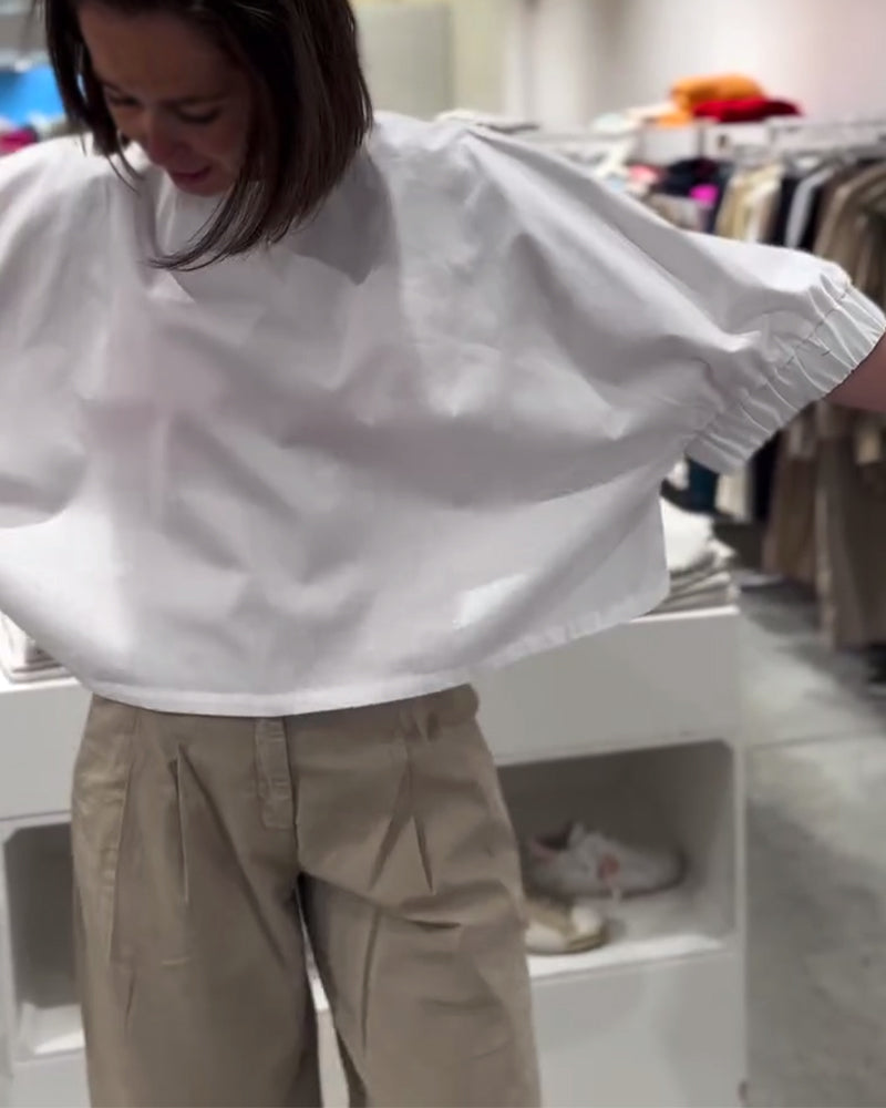 Lockere Bluse mit Fledermausärmeln in Volltonfarbe