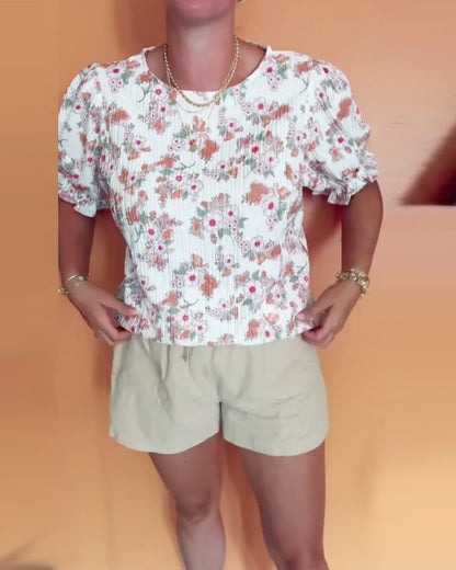 Bluse mit Rundhalsausschnitt und Blumenmuster, kurzärmlig