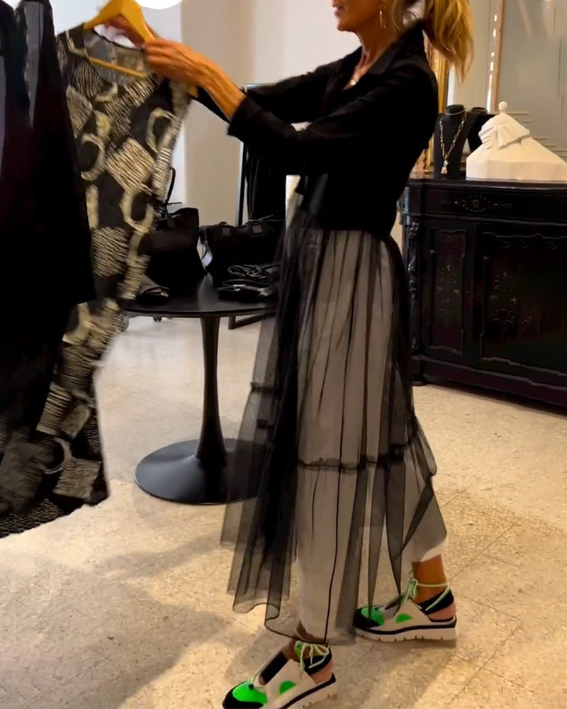 Camicia lunga alla moda in rete fluida