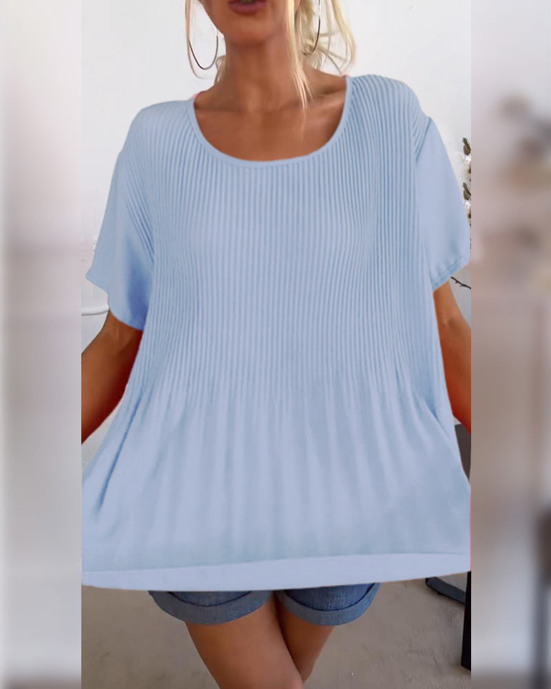 Blusa plissettata a tinta unita con scollo tondo