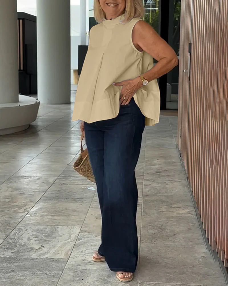 Blusa semplice senza maniche in tinta unita