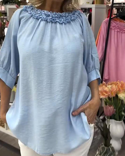 Lockere Bluse mit halblangen Ärmeln und Blumenmuster