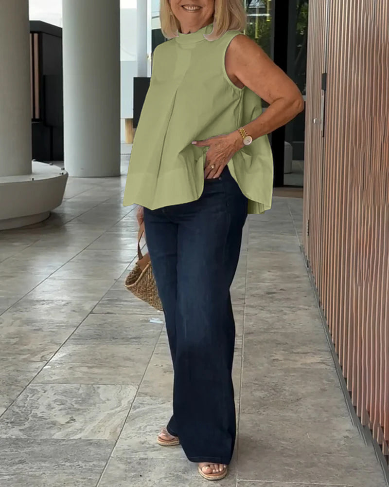 Blusa semplice senza maniche in tinta unita