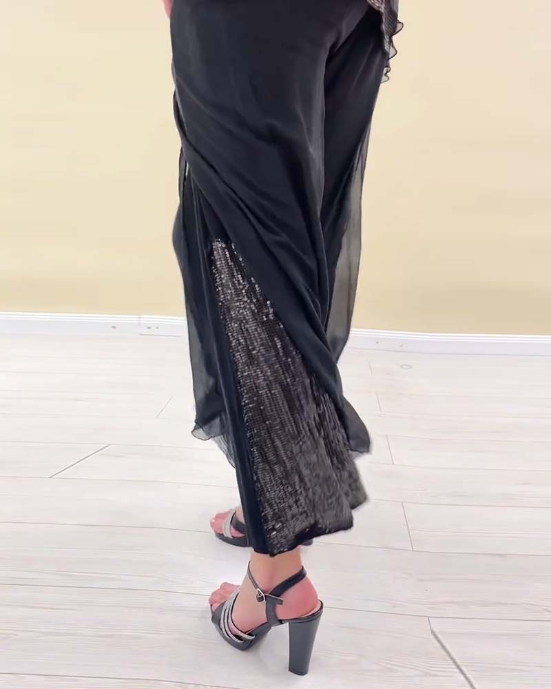 Langärmliger, einfarbiger Anzug mit Pailletten