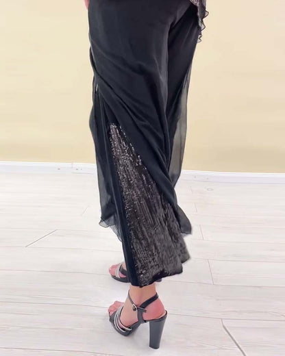 Langärmliger, einfarbiger Anzug mit Pailletten