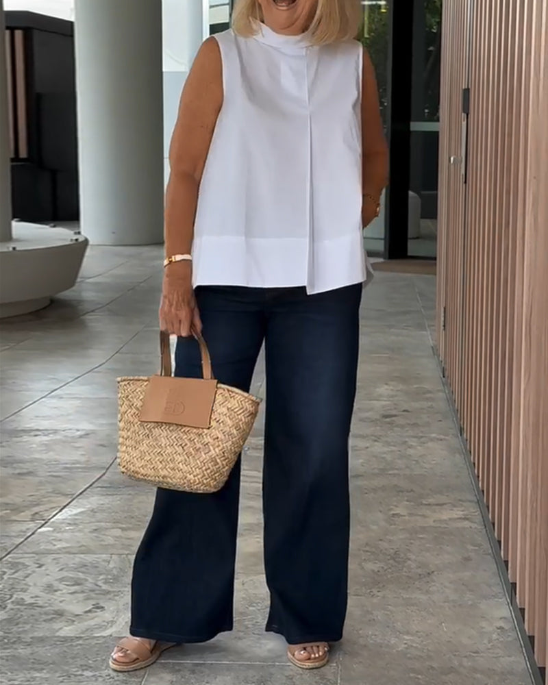 Blusa semplice senza maniche in tinta unita