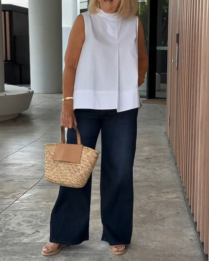 Blusa semplice senza maniche in tinta unita