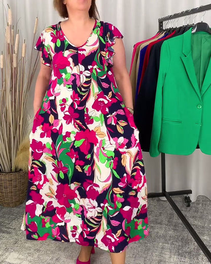 Kleid mit buntem Blumendruck und V-Ausschnitt