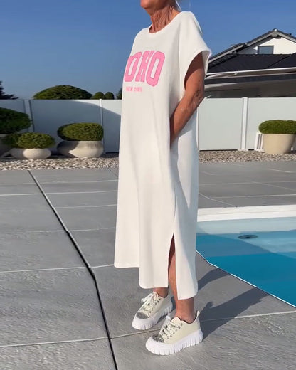 Modisches Kleid mit lockerem Schlitz