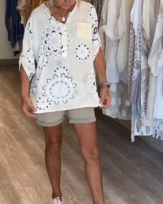 Vielseitige Bluse mit V-Ausschnitt und halblangen Ärmeln