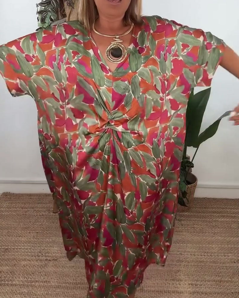 Kleid mit V-Ausschnitt und Twist-Print