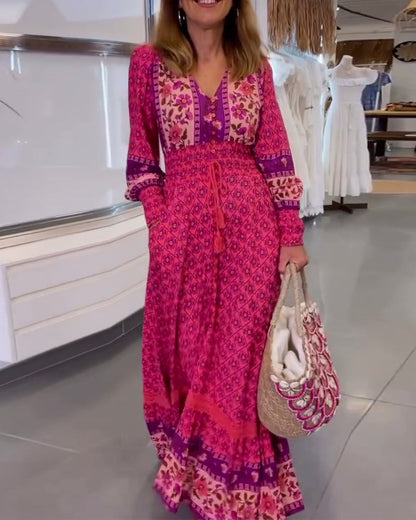 Elegantes bedrucktes Kleid mit V-Ausschnitt und langen Ärmeln