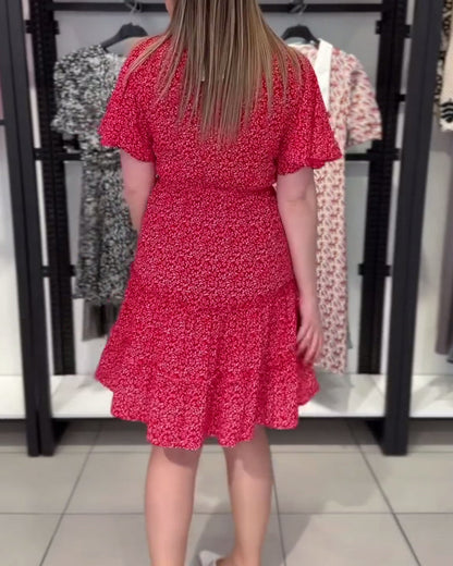 Figurbetontes Kleid mit V-Ausschnitt und Blumenmuster