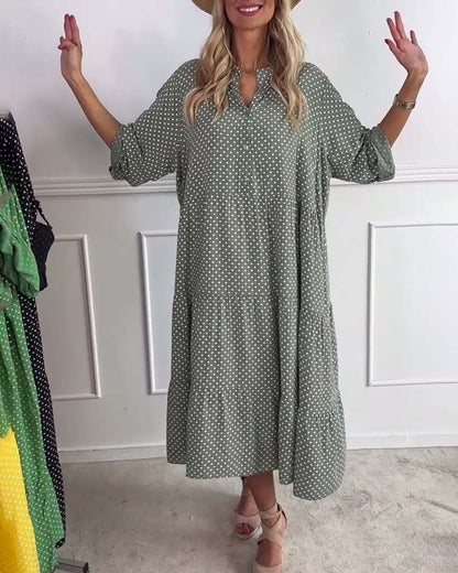 Abito a tubino a pois con mezza manica