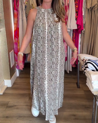 Elegante abito stampato senza maniche con scollo all'americana