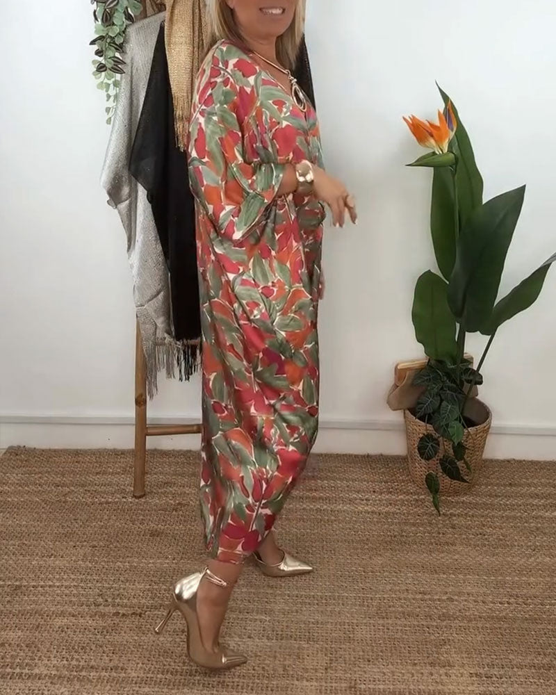 Kleid mit V-Ausschnitt und Twist-Print