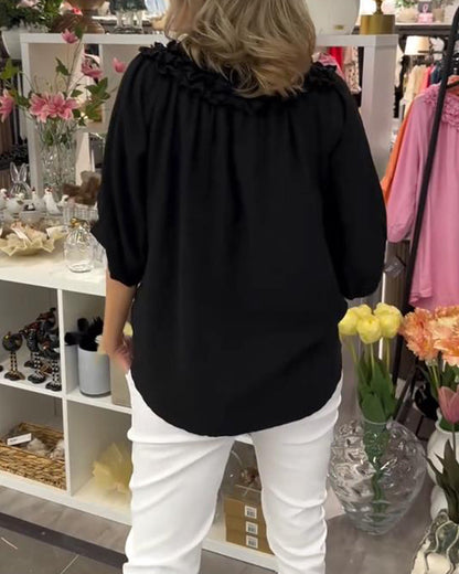 Lockere Bluse mit halblangen Ärmeln und Blumenmuster