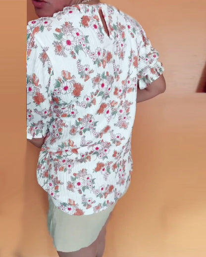 Bluse mit Rundhalsausschnitt und Blumenmuster, kurzärmlig