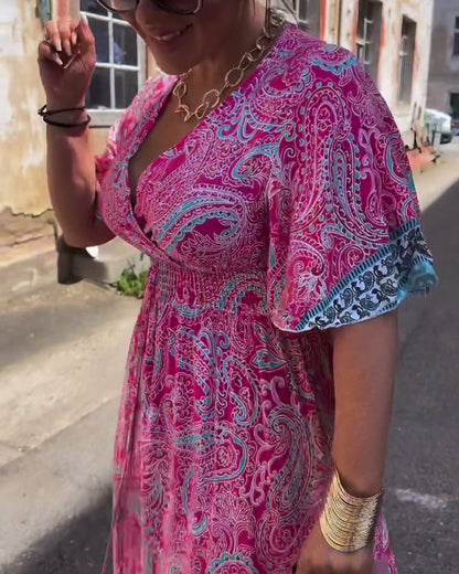 Abito stampato con scollo a V