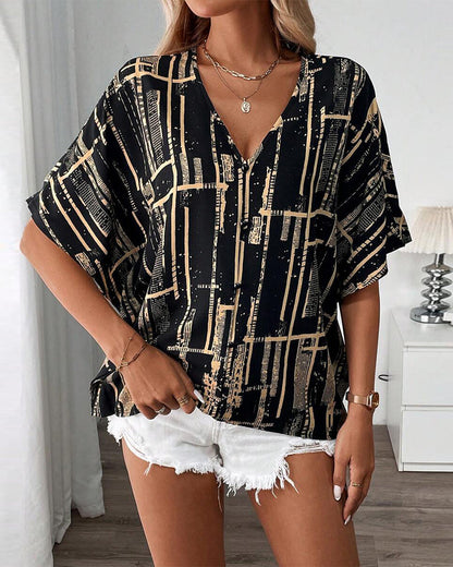 Camicetta stampata con scollo a V retrò e maniche a pipistrello