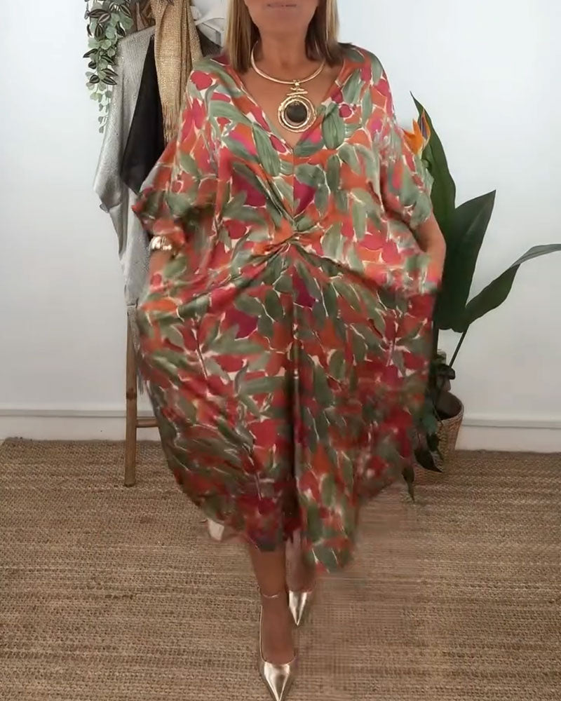 Kleid mit V-Ausschnitt und Twist-Print