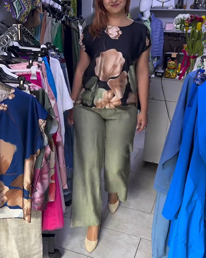 Kurzarmbluse mit Rundhalsausschnitt und Blumenmuster