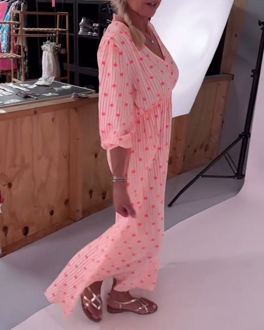 Elegante abito con scollo a V e stampa a cuore