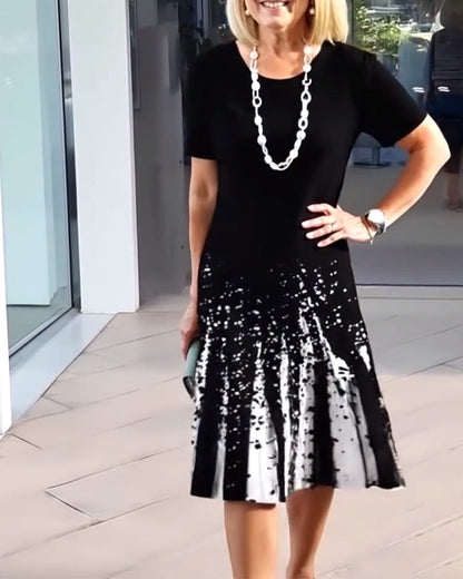 Temperamentvolles Kleid mit Pendler-Print