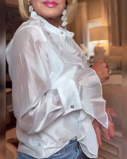 Elegante einfarbige Bluse mit Rüschen