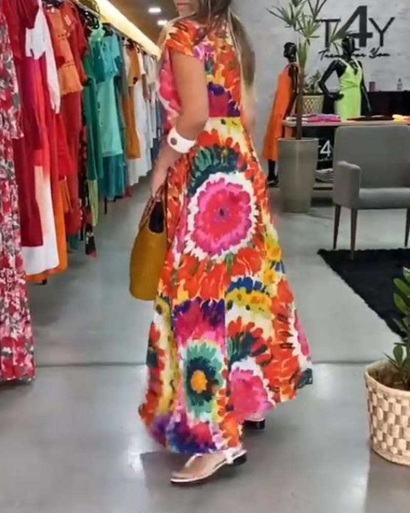 Buntes Kleid mit Taschen und Blumenmuster