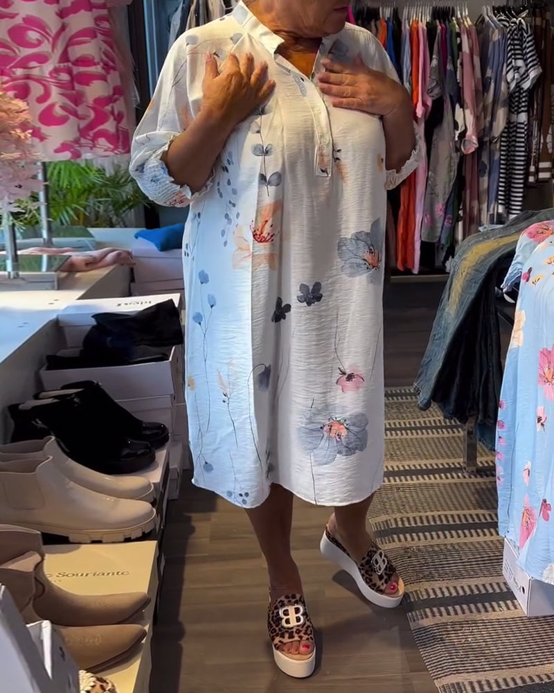 Abito a maniche corte con colletto rialzato e loto