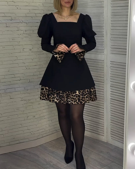 Elegantes Kleid mit Puffärmeln und Leopardenmuster