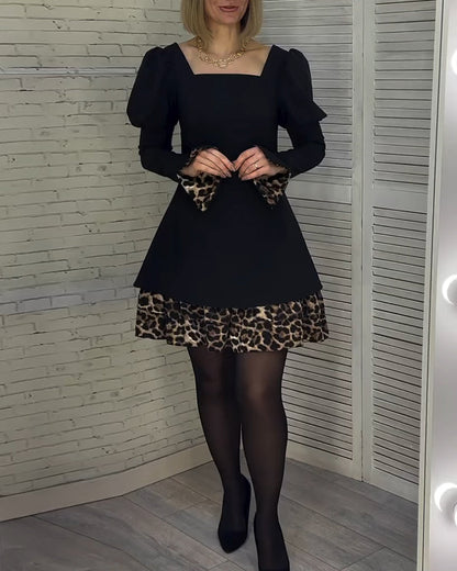 Elegantes Kleid mit Puffärmeln und Leopardenmuster