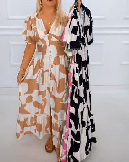 Festliches Kleid mit tiefem V-Ausschnitt und Print