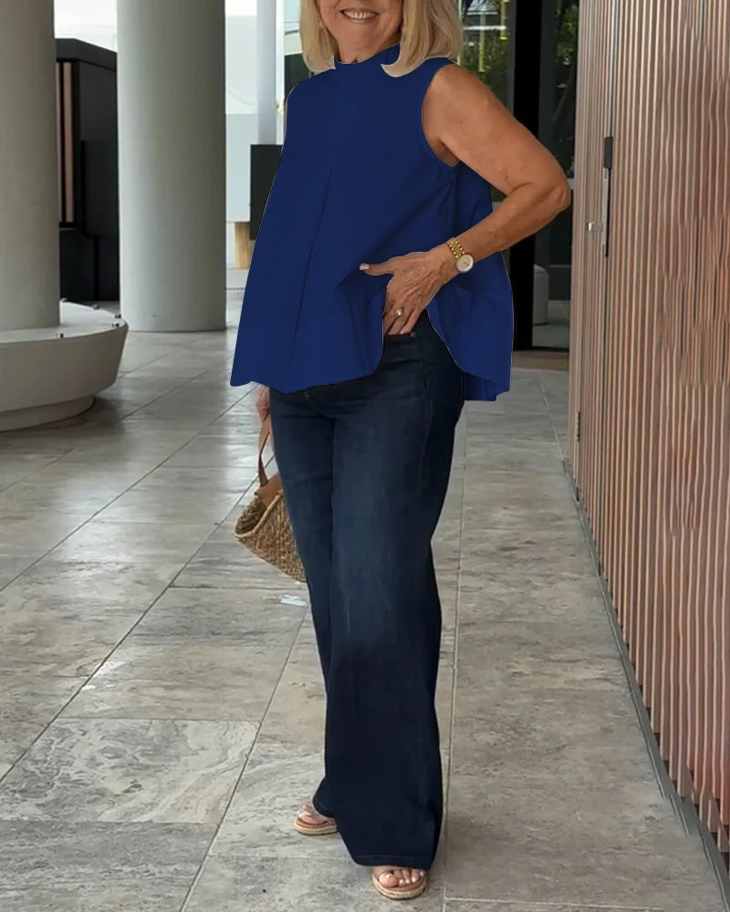 Blusa semplice senza maniche in tinta unita