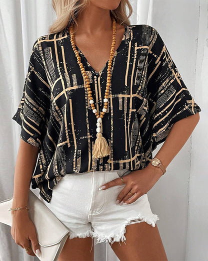 Camicetta stampata con scollo a V retrò e maniche a pipistrello