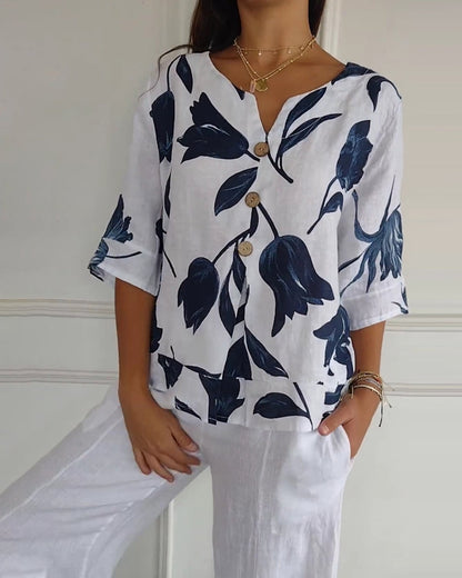 Top con bottoni in cotone e lino con stampa floreale