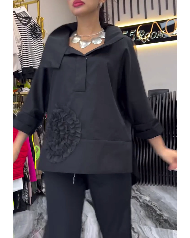 Bluse mit Blumenmuster und Spitzenbesatz am Revers