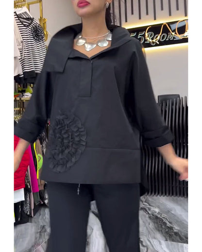 Bluse mit Blumenmuster und Spitzenbesatz am Revers