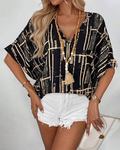 Camicetta stampata con scollo a V retrò e maniche a pipistrello