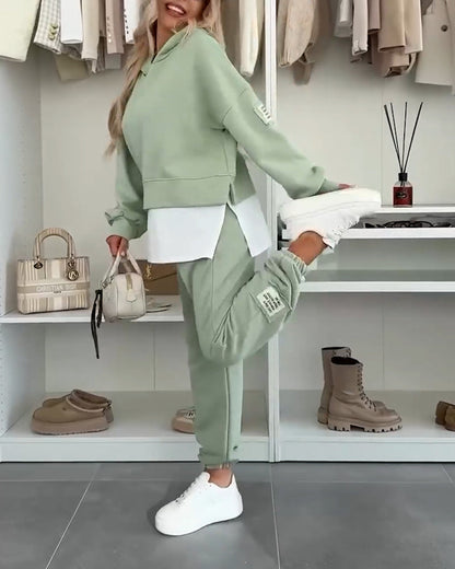 Lässiges Set aus Kapuzenpullover und Hose