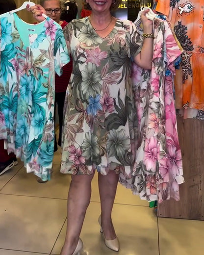 Kleid mit V-Ausschnitt und kurzen Ärmeln und Blumenmuster