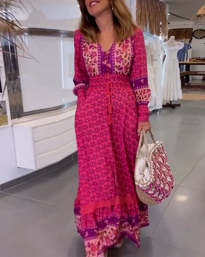 Elegantes bedrucktes Kleid mit V-Ausschnitt und langen Ärmeln