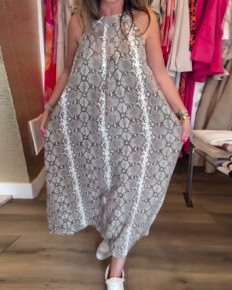 Elegante abito stampato senza maniche con scollo all'americana