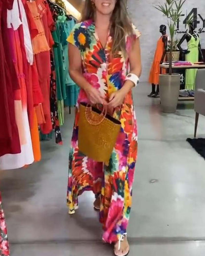 Buntes Kleid mit Taschen und Blumenmuster