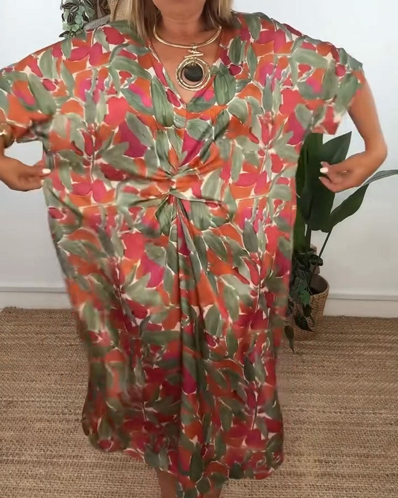 Kleid mit V-Ausschnitt und Twist-Print