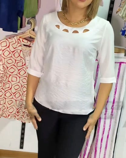 Bluse mit Rundhalsausschnitt und einfarbiger Hohloptik