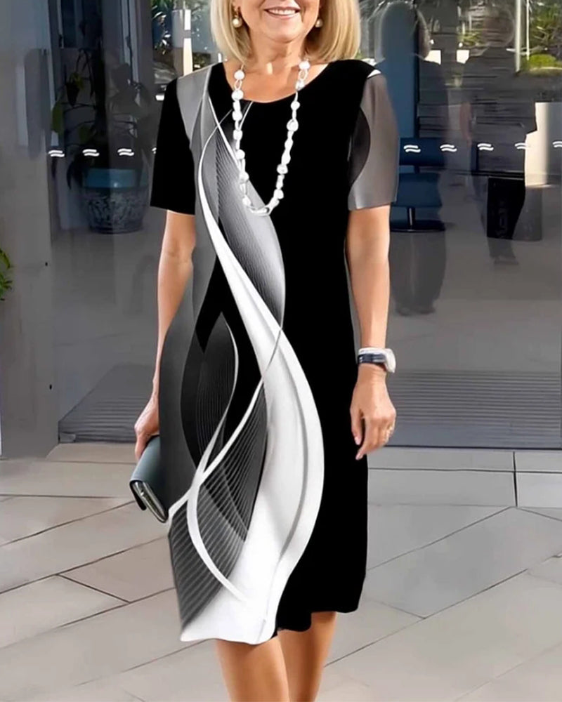 Abito con stampa geometrica e scollo rotondo