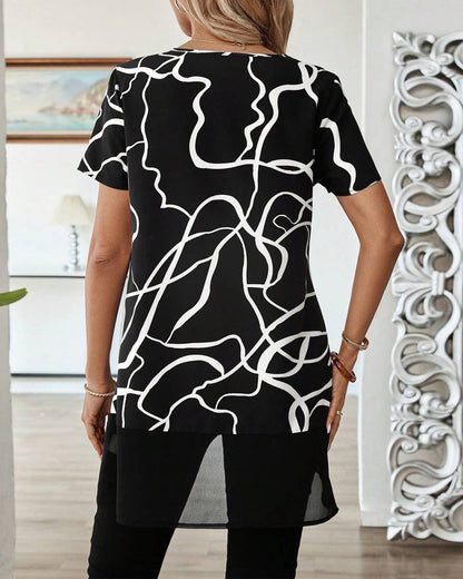 Lässige Bluse mit Rundhalsausschnitt und unregelmäßigem Muster